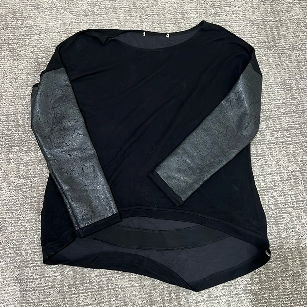Very cool sweater with leather sleeves